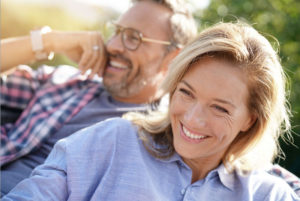 Full Arch Dental Implant Patients Smiling After Getting Their New Smile In A Single Day
